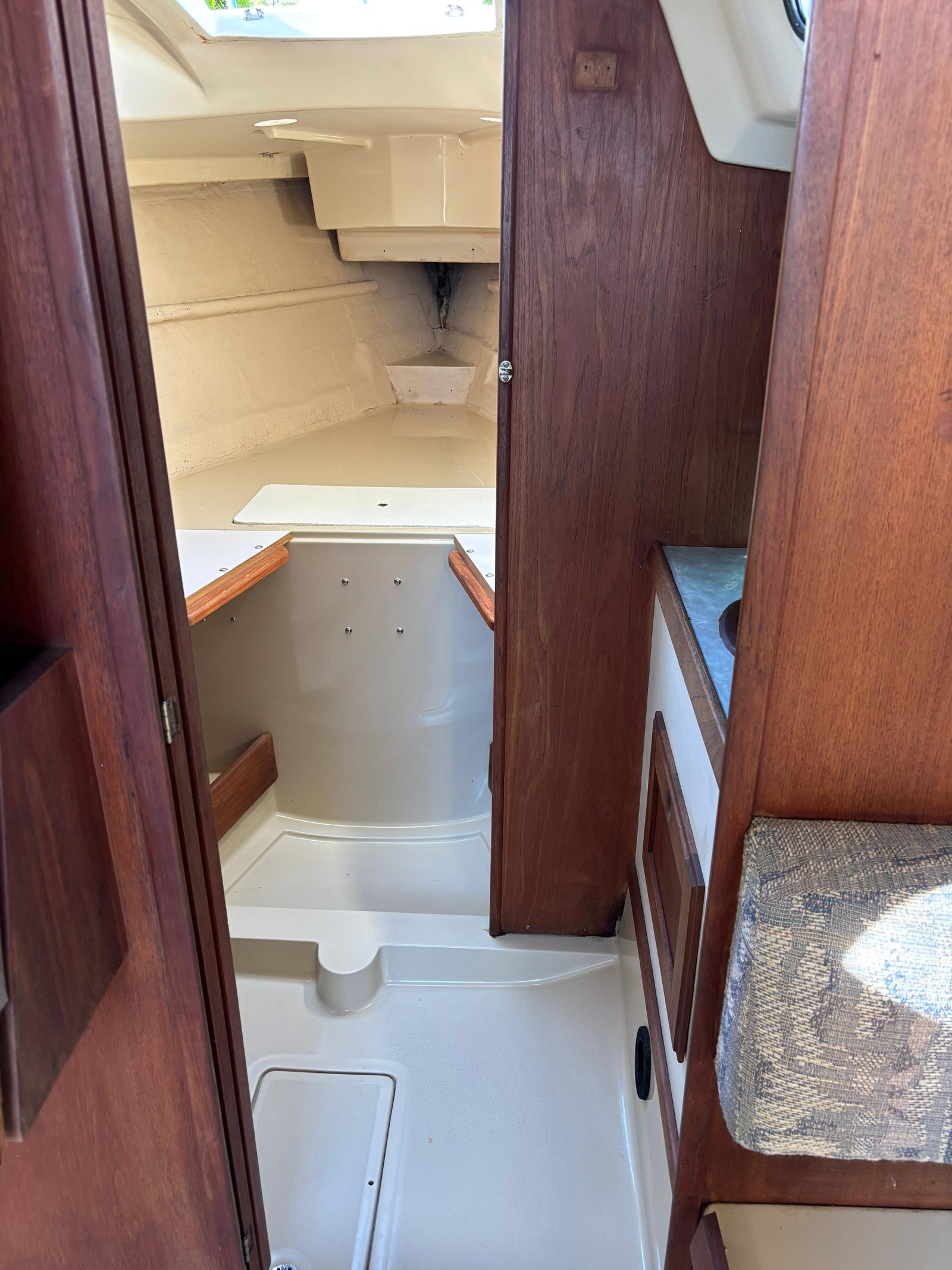 Clean boat cabin hallway and head area